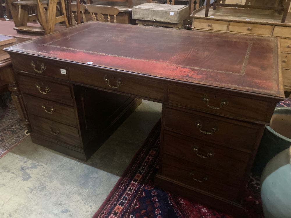 A late Victorian mahogany pedestal partners desk, width 168cm depth 99cm height 83cm